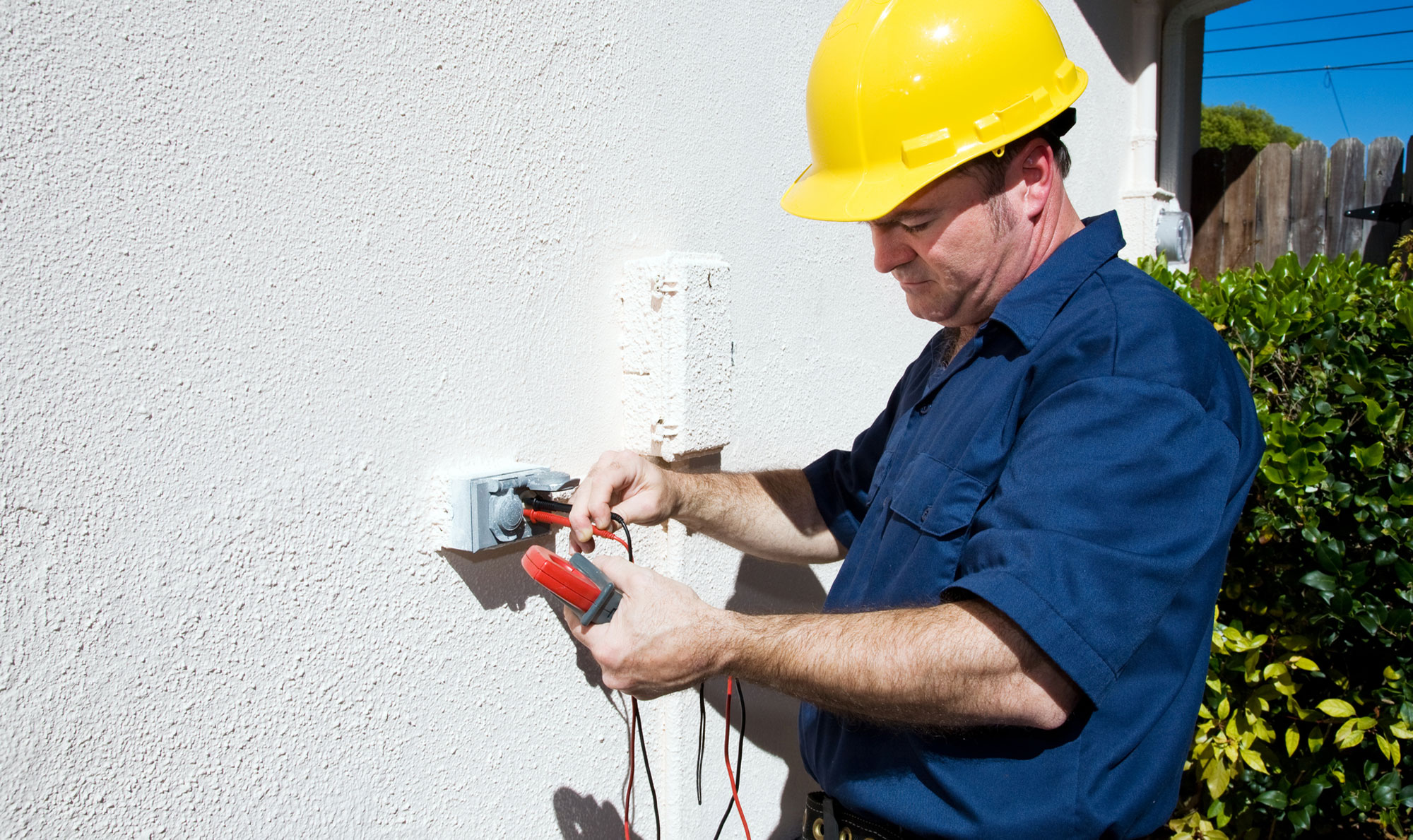 Inspector Checking Electrical Connection